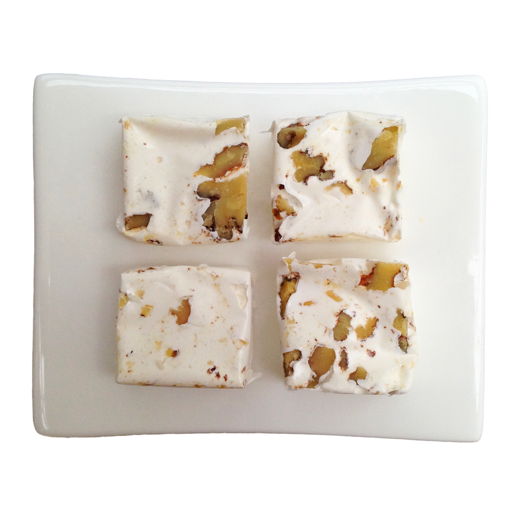 Nougat squares with walnuts throughout