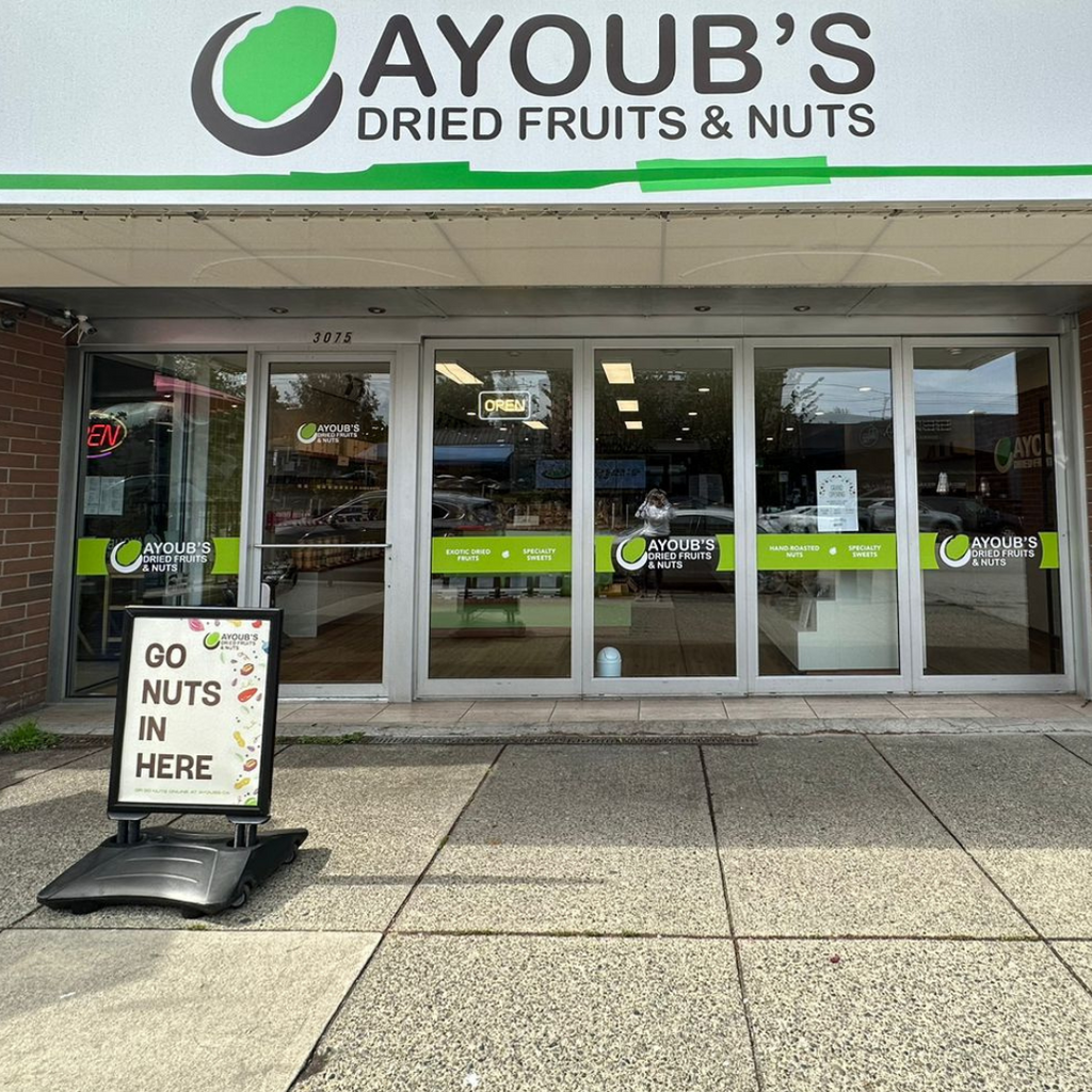 A photo showcasing the front of Ayoub's Dried Fruits & Nuts store on Main St, Vancouver, BC